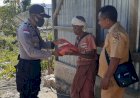 Bersama-Camat-dan-Kepala-Desa,-Polsek-Lamaknen-Salurkan-Beras-untuk-Masyarakat-Jelang-Hari-Bhayangkara-ke-74