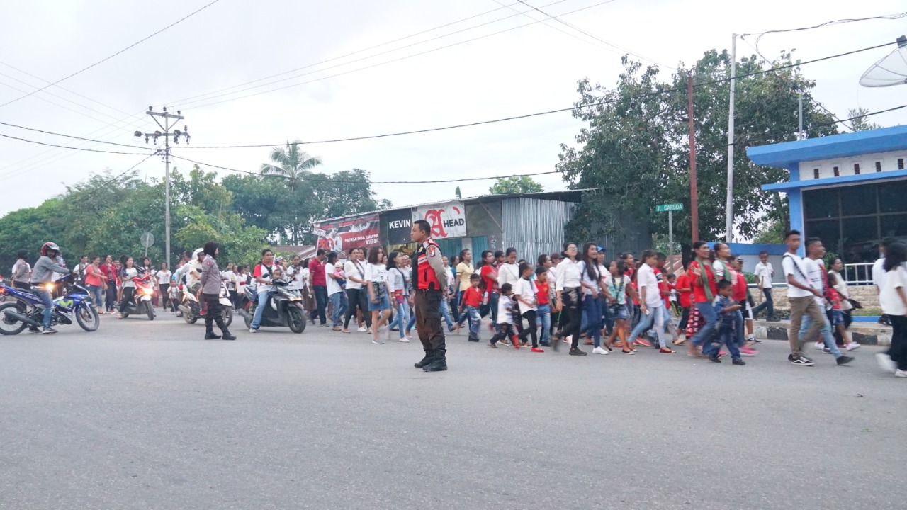 Ribuan Umat Kristen Pawai Obor Rayakan Paskah 2019, Personil Polres Belu Turun ke Jalan Lakukan Pengamanan